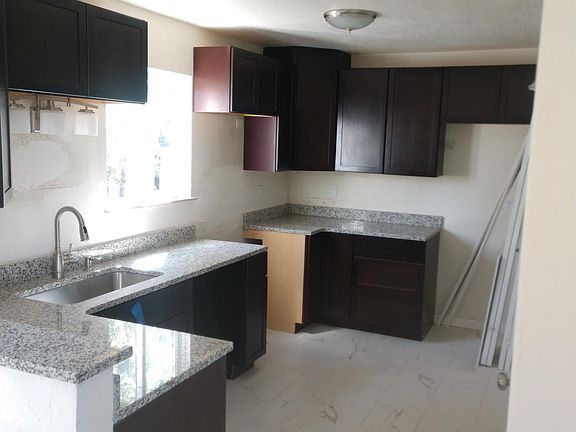 New stainless steel range, microwave, refrigerator with ice maker, and dishwasher coming Wednesday