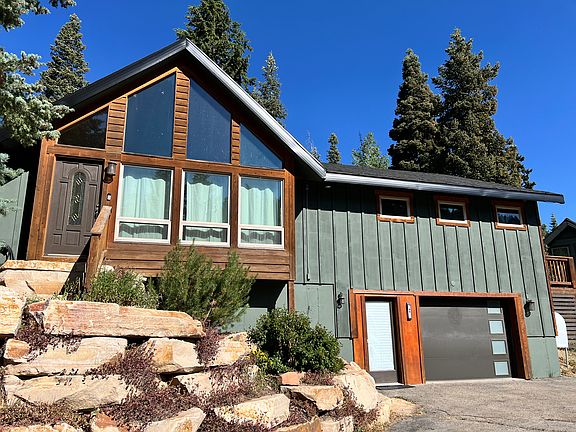Exterior with 1 car garage and mud room, mother-in-law suite on ground level.