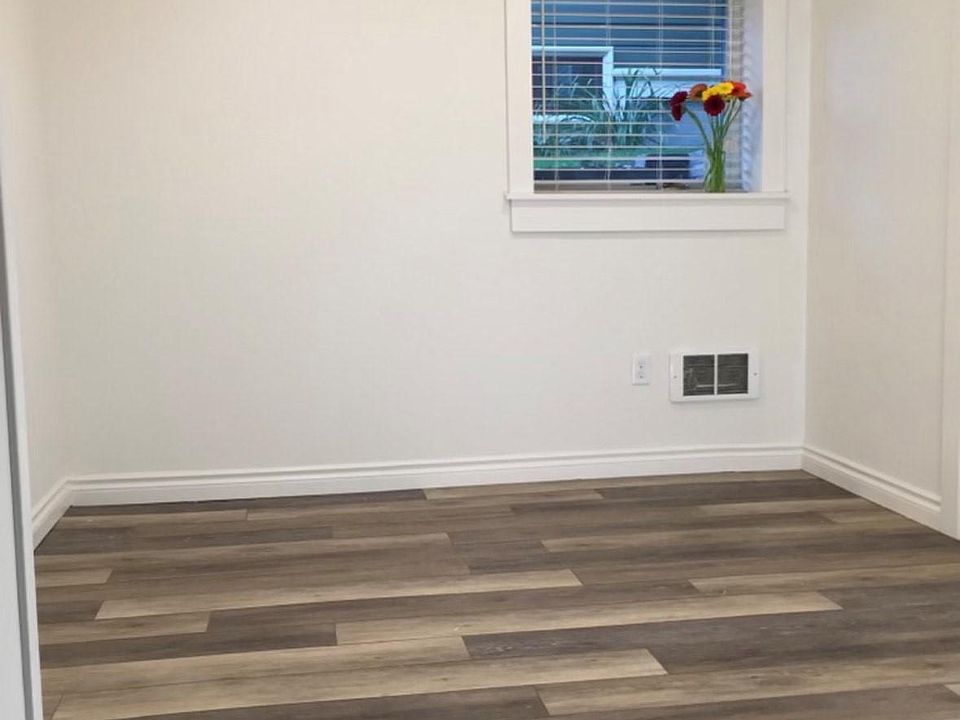 11' x12' bedroom with windows on two sides facing south and west.