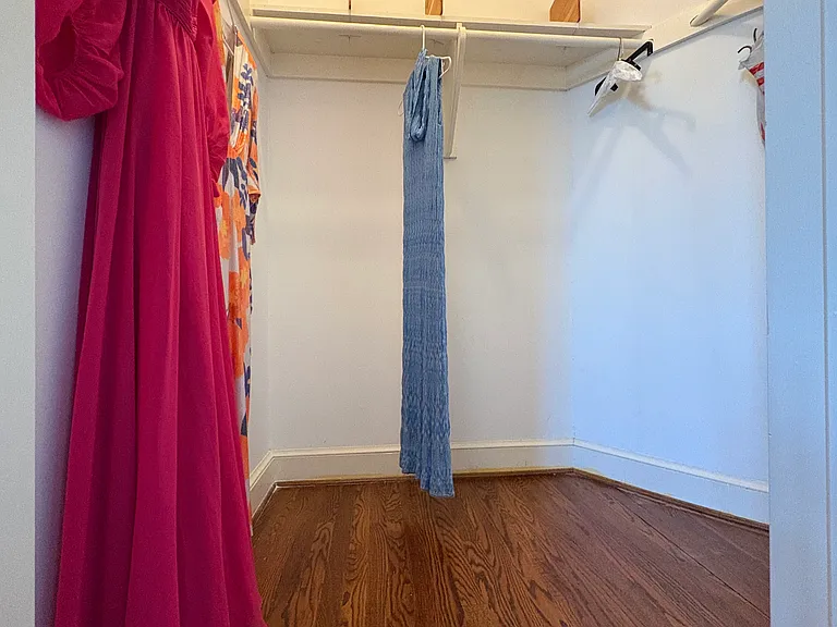 One of the walk-in closets in the primary dressing "lounge."