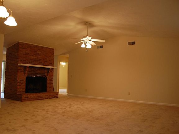 Fireplace backs up to Entry Foyer
