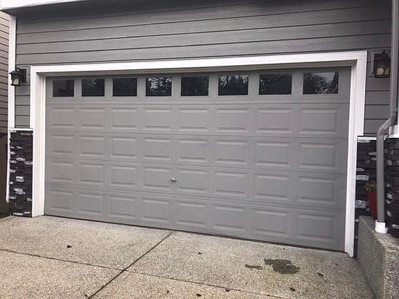 Two-car garage with a mudroom entrance.