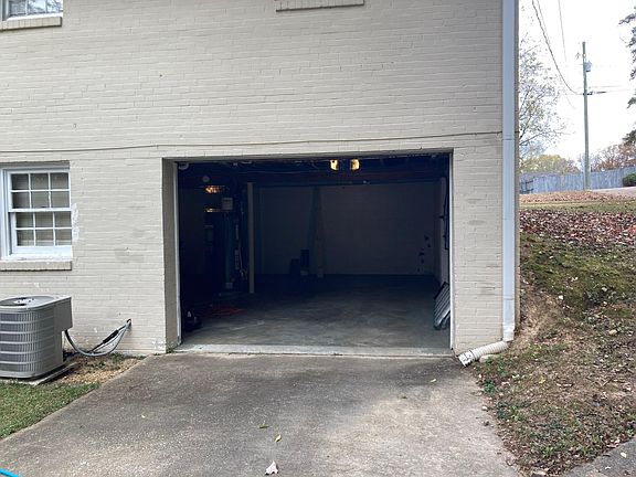 509 unit, rear of unit. Drive-in basement/garage.