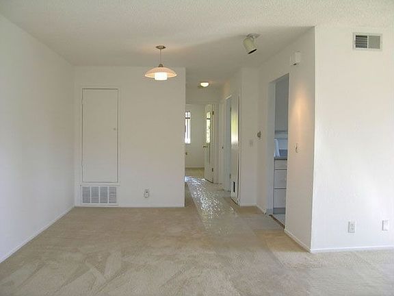 Dining and hallway to kitchen bedrooms