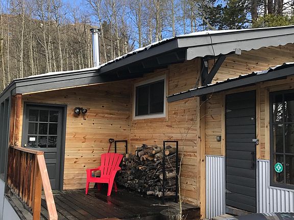 Front entrance with storage shed on right