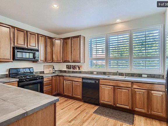 Large kitchen with gas stove; great for cooking and entertaining!