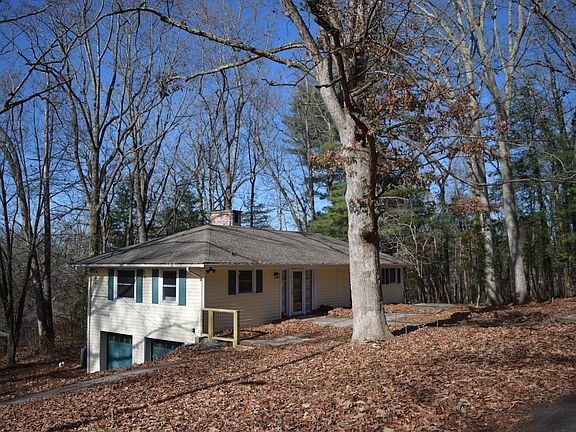 1/2-acre property surrounded by heavily wooded mature trees provide a beautiful environment in desirable neighborhood.