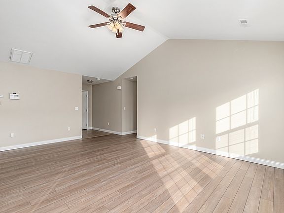 Living room with vaulted ceiling