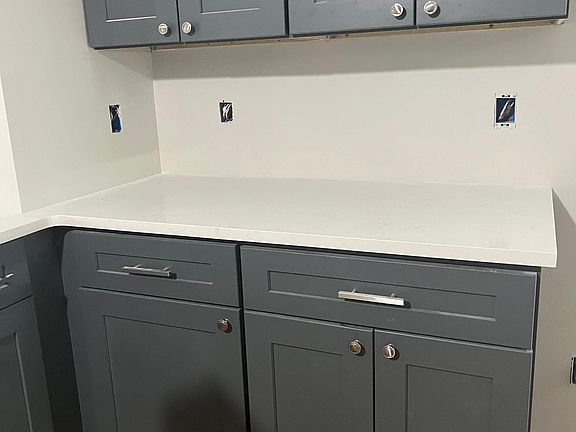Kitchen with quartz tops