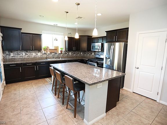 2nd image of 9759 Canyon Landing Ave