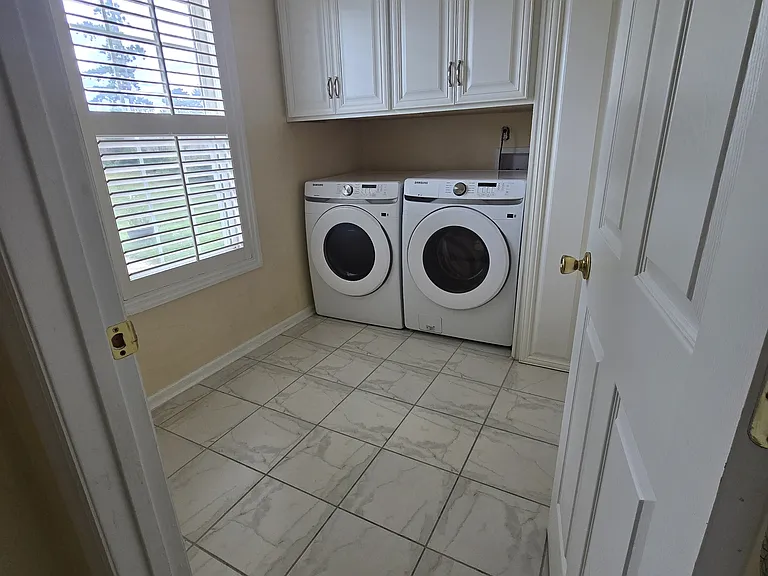 Laundry Room equipped w/ washer & dryer