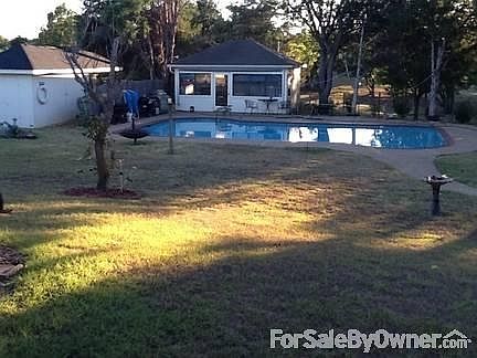 Pool, pool house, storage shed