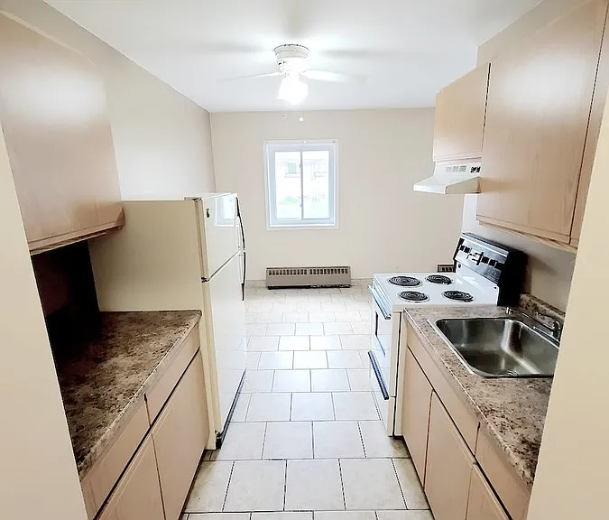 2880 Tecumseh Rd W #303 — Photo 5