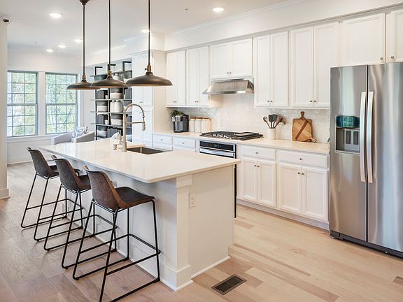 Kitchen with large center in the Shire Model at Valley Forge Greene