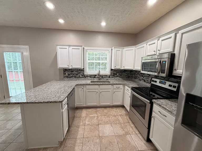 4517 Hammock Dr — Photo 8
