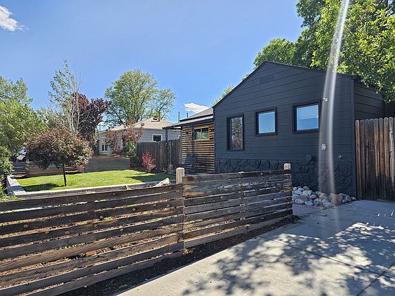 View from off-street parking at front, towards front patio.