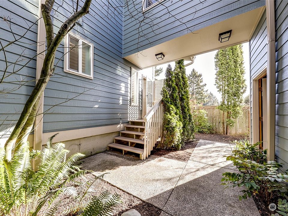 Private entrance to this lovely corner unit. to the right is the garage entrance.