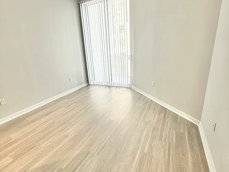 2nd Bedroom with entry to the balcony