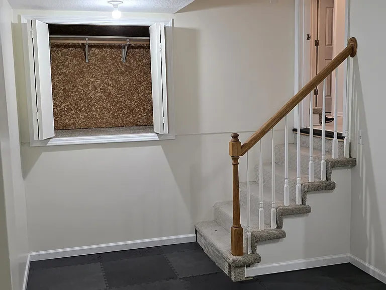 Sub-basement - exercise room, movie room, playroom with large storage closet