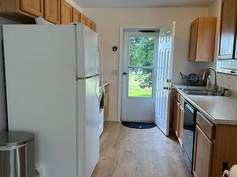 Kitchen with back door to patio