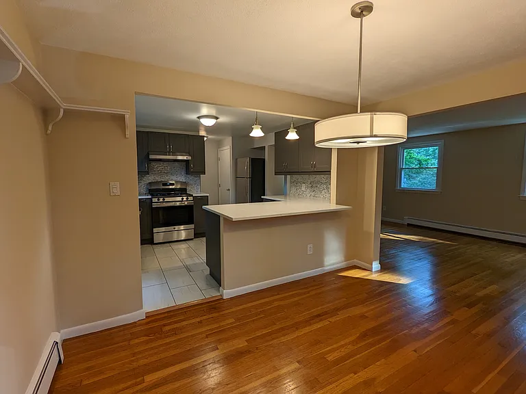 From Dining Room, Kitchen on left, Living Room on right