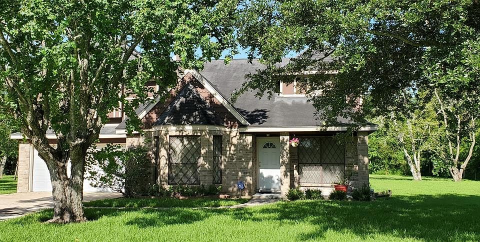 Stylish Tudor Modern 4 BR,2.1BA Family Home on nearly an Acre of land. Partially wooded.