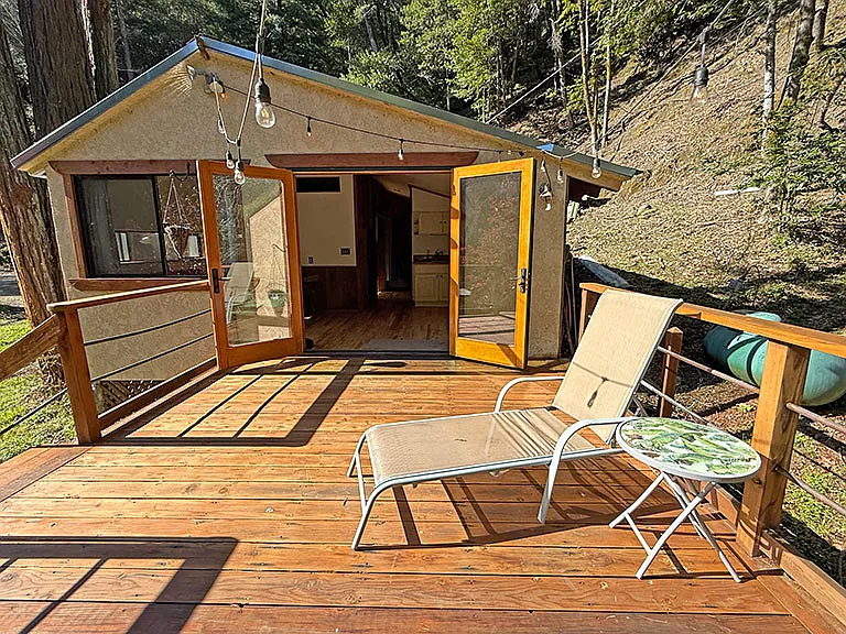 Private deck from outdoor clawfoot tub & shower