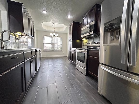 2nd image of 910 Sunset Ln