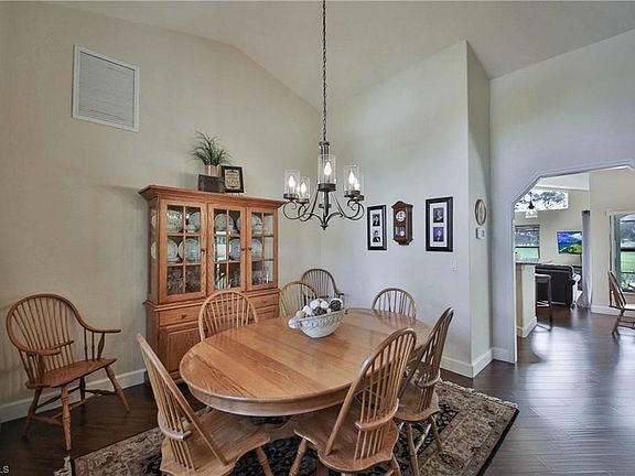 Formal Dining Area with View towards Kitchen, Family Room and Informal Dining Area