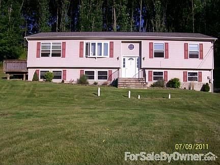 Expansive front set back from road : Exquisite view of Nature Preserve from front of house and 7 per