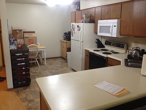 Kitchen with area for dining table.