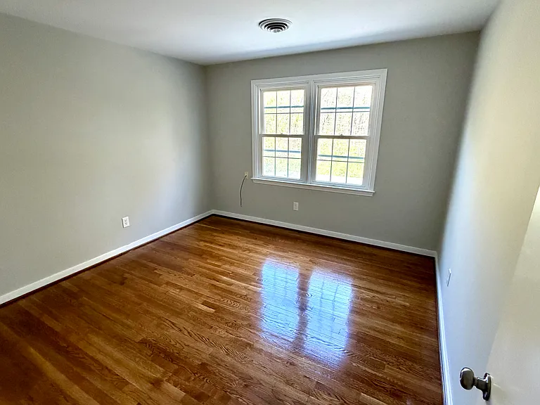 Back bedroom with hardwood floors
