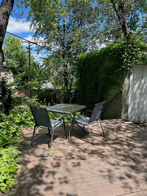 Deck overlooking enclosed backyard