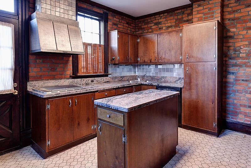 Large kitchen with granite counters