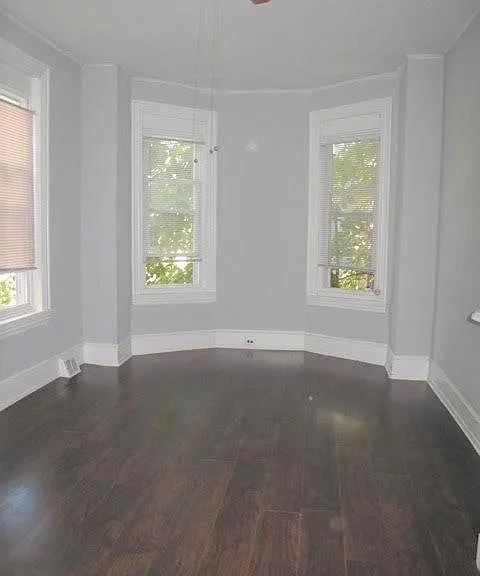 Bright Bedroom with Hardwood Floors