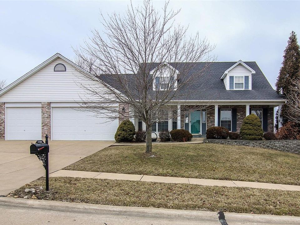 Welcome to 1121 Whispering Pines Drive . . .