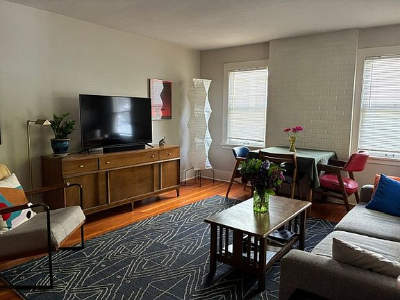 Living room, side windows, wood floors