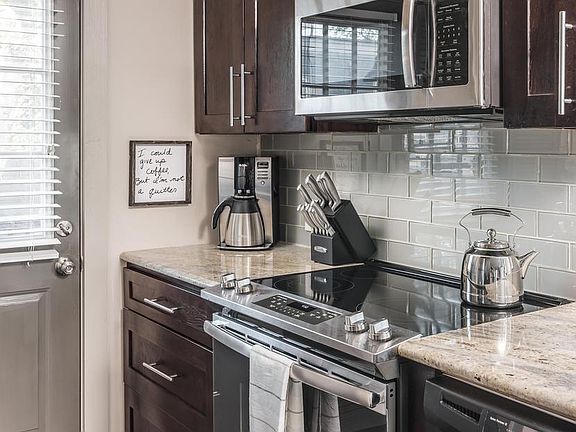 In the kitchen you'll have stainless steel appliances as well as a pantry to store goods.
