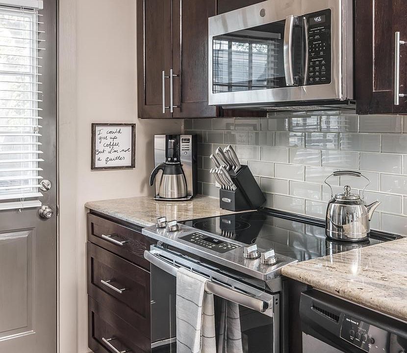 In the kitchen you'll have stainless steel appliances as well as a pantry to store goods.