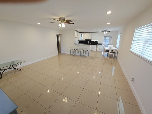 large living room-porclain tiles all around the house