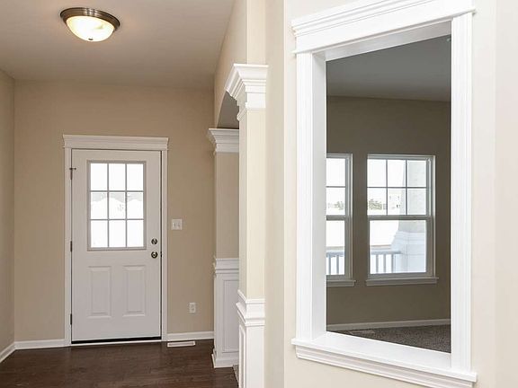 Flex room off of the foyer with added architectural features.
