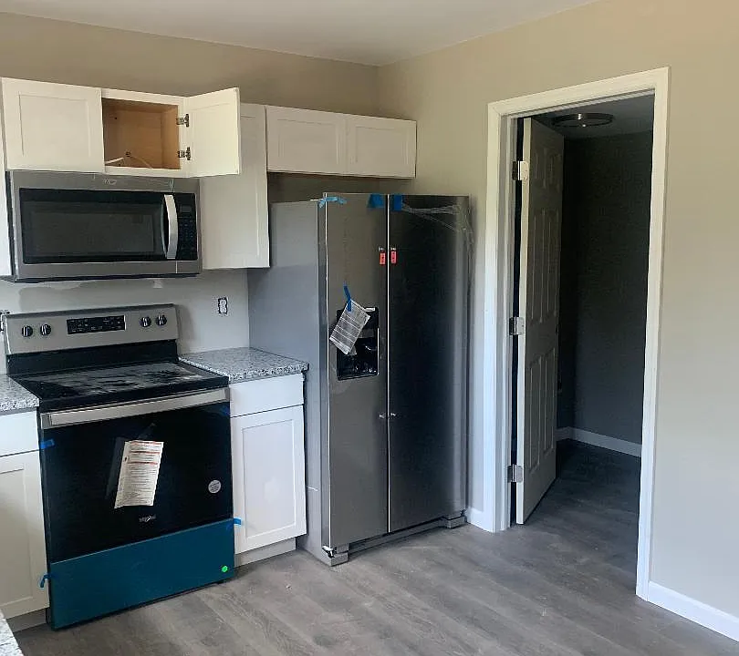 Kitchen with laundry room off with half bath