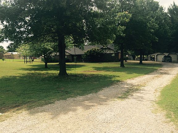 Beautiful trees adorn front