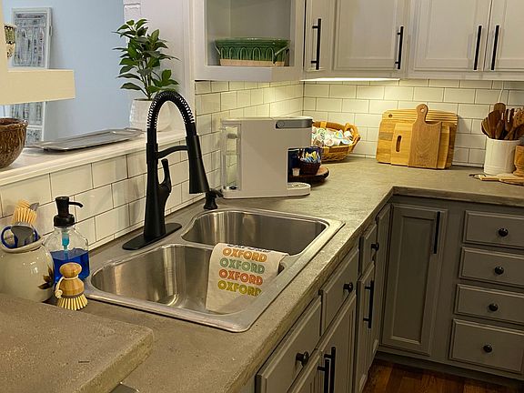 Custom concrete countertop with subway tiles