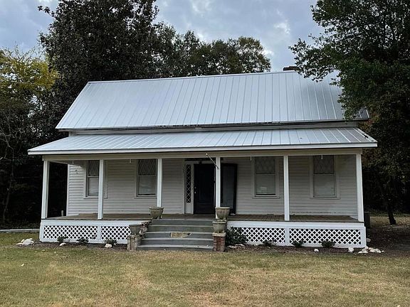 Large front porch, wood siding, and beautiful metal roof enhances the southern charm to this rare rental opportunity