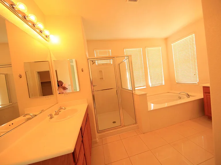Master Bath Room with shower and Bath tub.