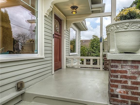 Graciously inviting and ready to be yours- NEW exterior paint, vinyl windows throughout, NEWER hot water heater.