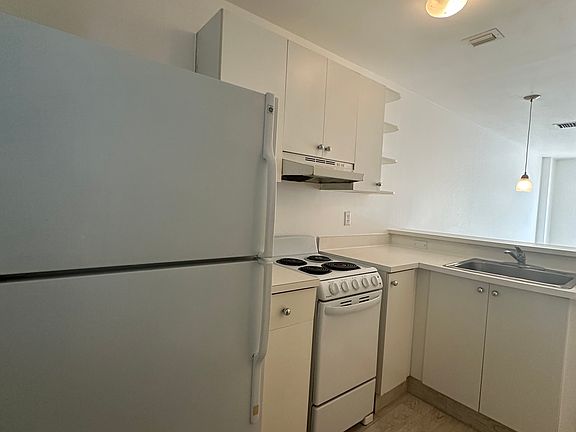 5th image of 835 SW 2nd St #209