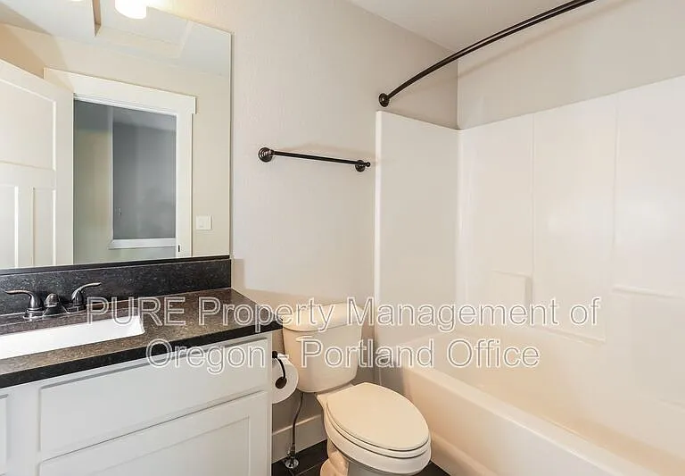 1801 NE Robert Rd — Photo 15