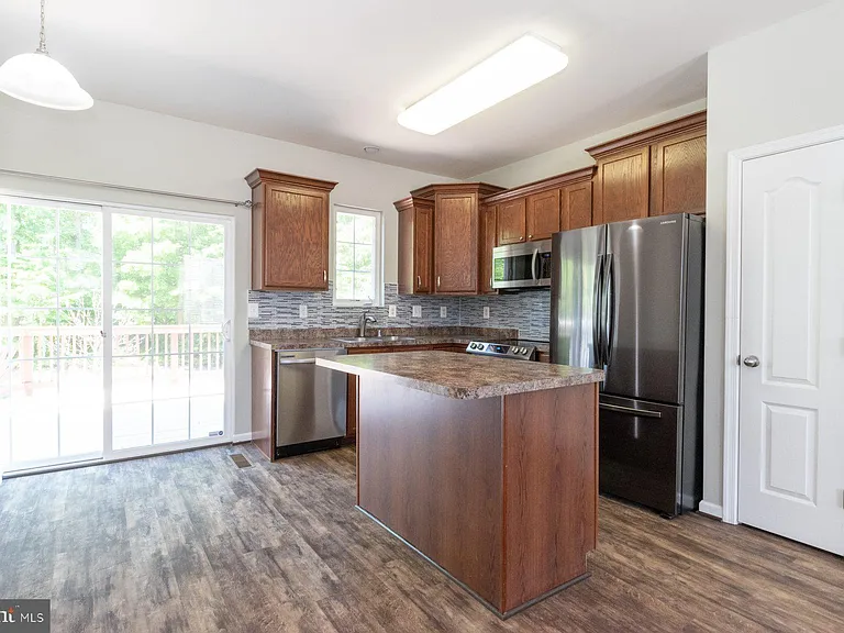 6810 Warfield St — Photo 3